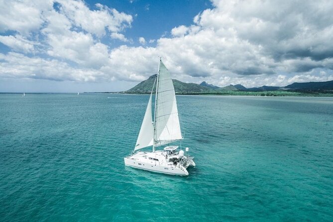 Catamaran Cruise: Isle aux Cerfs, Including BBQ Lunch, in Mauritius - Passing Ile du Phare on the way to Isle aux Cerfs