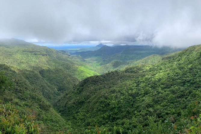 Dolphin Experience in Open Sea and South West Tour of Mauritius including Lunch - Chamarel’s Seven Colored Earth and Waterfall