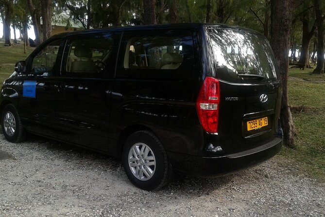 Private Luxury Minibus Transfer from Mauritius Airport to City - Finding your driver near Exit Gate 7
