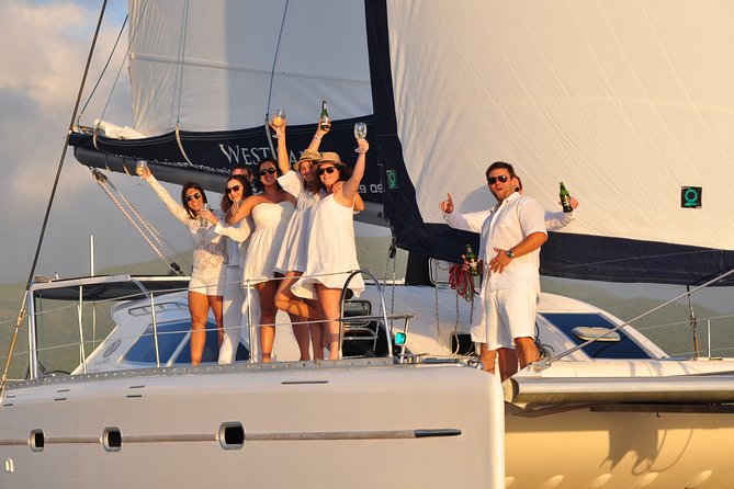 Sailing Catamaran Cruises - Snorkeling in clear lagoon water