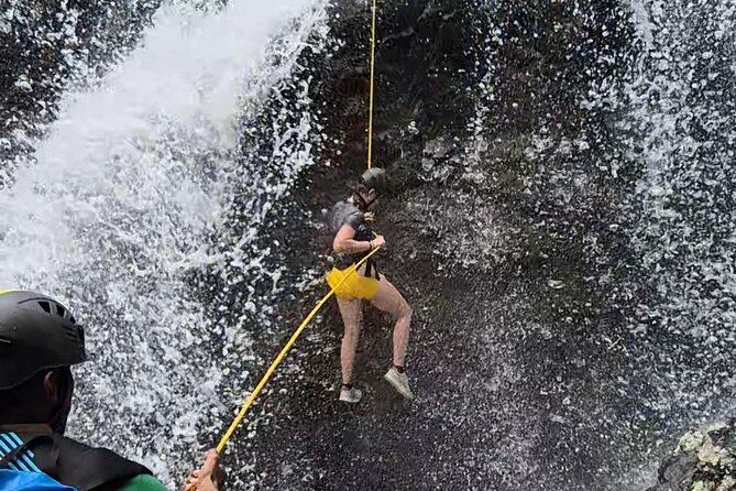 Tamarind Falls Abseiling - Swimming beneath the waterfalls
