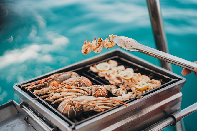 WEST : OCÉANE Private full day cruise to Ile aux Benitiers - Lunch, drinks, and the life aboard the catamaran